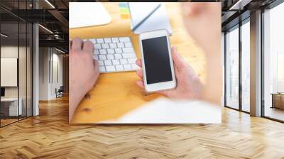 woman hands close up working on white computer keyboard and smartphone, work from home concept. work online, shopping Wall mural