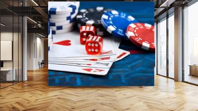 A vibrant scene featuring poker chips, casino cards, and dice, capturing the excitement of gambling in a lively casino atmosphere Wall mural