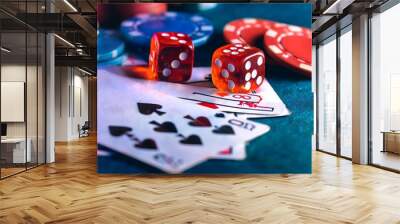 Chips and dice symbolizing luck and chance in a vibrant casino game setting Wall mural