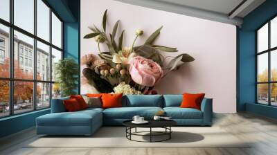 Horizontal image of fresh cut, pastel flowers and greenery on a white background with copy space Wall mural