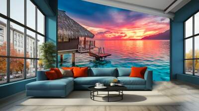 Stunning colorful sunset sky with clouds on the horizon of the South Pacific Ocean. Lagoon landscape in Moorea. Luxury travel. Wall mural