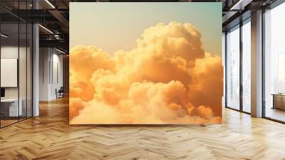  Wisps of clouds hit by yellow light from above with a bluish-yellow background Wall mural