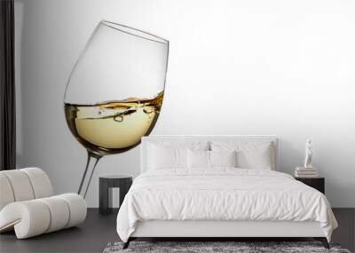 slanted white wine glass on a white background Wall mural