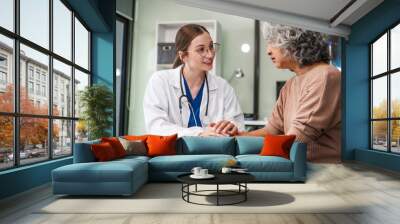 Caucasian female psychiatrist sits at her desk, providing mental health consultations and therapy sessions to her patients with empathy and expertise. Wall mural