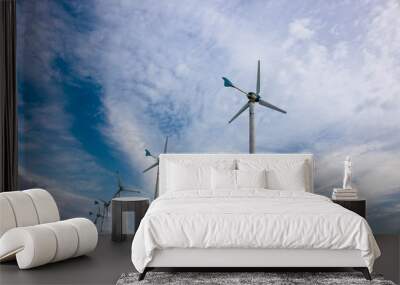 Windmills electricity and Bright blue sky with fluffy white clouds. Renewable energy. Sustainable electricity energy conservation concept. Wall mural