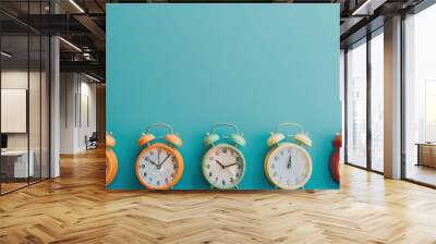 A creative composition of multiple alarm clocks set to different times, symbolizing time management and the importance of being punctual. Wall mural