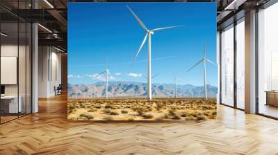 A wind turbine farm in a desert landscape with turbines dotting the horizon Wall mural