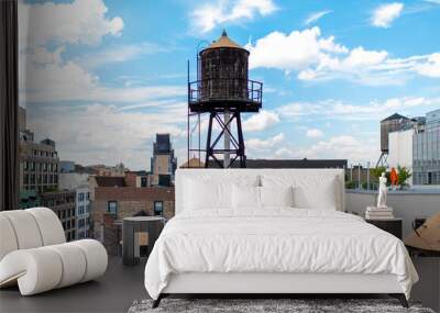 Iconic water tower on top of office building in New York City Wall mural