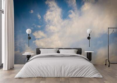 White fluffy clouds and blue sky Wall mural