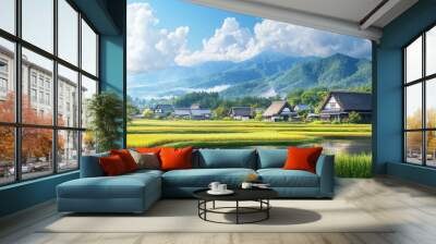 A picturesque Japanese countryside scene with rice fields, traditional farmhouses, and distant mountains under a bright sky. Wall mural