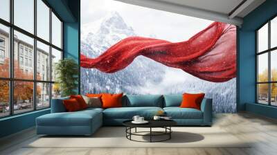 A red scarf blowing in the wind, with snow-covered mountains and trees in the background Wall mural