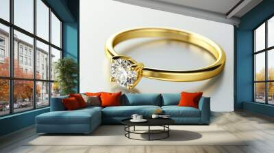 A simple gold ring with a diamond, isolated on a smooth white background, reflecting light. Wall mural