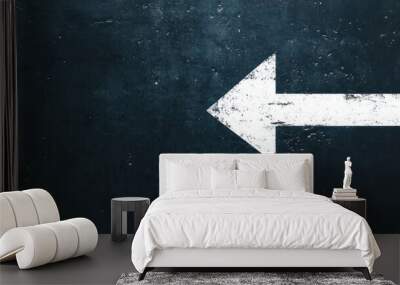 A simple white arrow on a dark background pointing forward, symbolizing clarity Wall mural