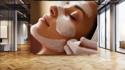 Woman receiving a chemical peel treatment, focusing on skin rejuvenation and professional exfoliation techniques. Wall mural