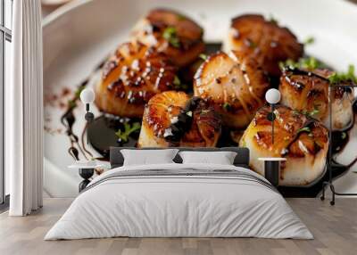 A plate of scallops with a sauce on top Wall mural