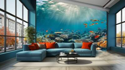 A panoramic view of a vibrant coral reef teeming with colorful fish, sunlight dappling through the clear turquoise water Wall mural