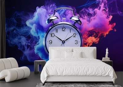 A vintage alarm clock surrounded by vibrant blue flames and soft, colorful smoke. The image combines the intensity of fire with the dreaminess of pastel clouds, creating a striking and surreal Wall mural