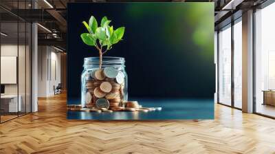 Coins in a clear jar, with a tree sprouting out, depicting savings and growth Wall mural