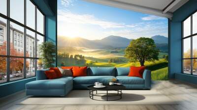 Sunrise over a lush green valley with mountains in the background. Wall mural