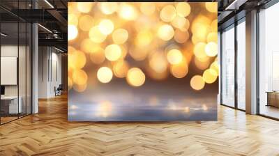 Golden bokeh background, soft glimmering lights creating a festive ambiance. Wall mural