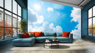 The blue summer sky with white fluffy clouds. Photo from window on the airplane. Wall mural