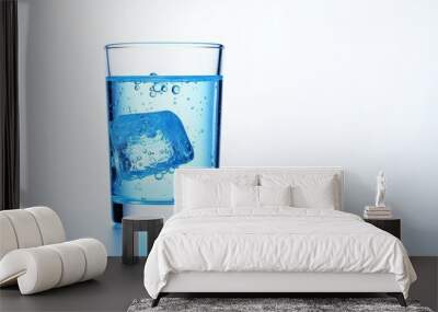 Isolated white background with a large vista of fresh blue natural drink water with bubbles Wall mural