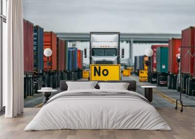 A truck approaches a bright yellow 