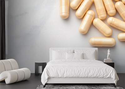 Detailed shot of magnesium capsules on a clean white surface, energy and muscle support Wall mural