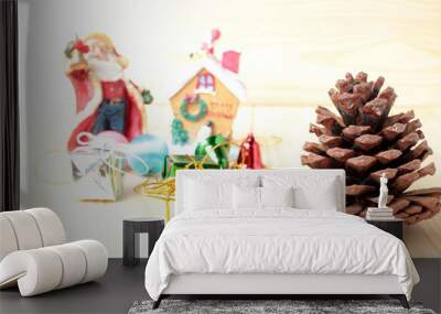 christmas gifts decoration and pine cones on the wooden background. Wall mural