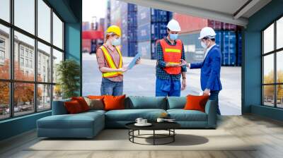 Manager put hands gel to technician or engineer worker while secretary record or check list of staff in container workplace area. Procedure to prevent covid virus infection of new normal lifestyle. Wall mural