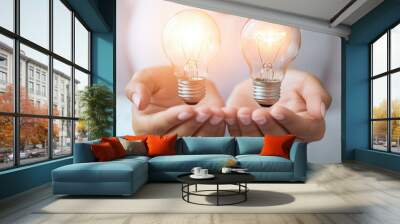 Hands Holding Glowing Light Bulbs   Innovation  Creativity  Ideas Wall mural