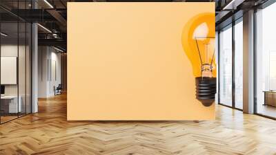 Light Bulb Idea Concept on Yellow Background Wall mural