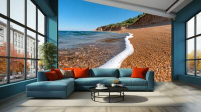 Sandy Beach Coastline with Clear Blue Water and Foamy Wave Wall mural