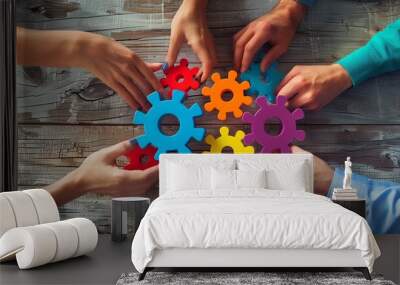 A team of people of different races and ethnicities are working together to assemble a colorful set of gears. The image is a symbol of teamwork and cooperation. Wall mural