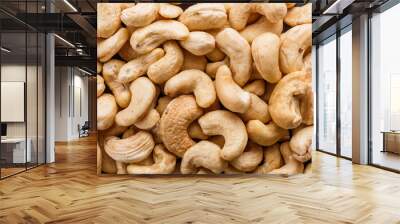 cashew nuts on a dark stone background Wall mural