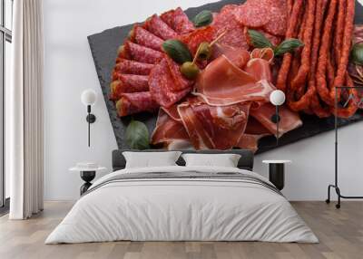 Cold smoked meat plate on a white background Wall mural