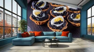 delicious snack tartlets on dark stone background Wall mural