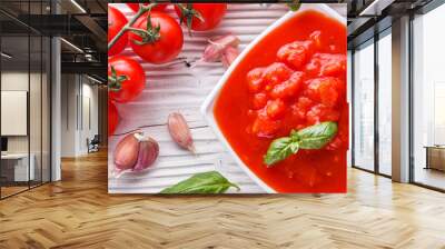 juicy canned tomatoes on wooden rustic background Wall mural