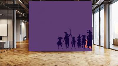 A captivating silhouette of children dressed in Halloween costumes, showcasing the spirit of trick or treating. The image evokes themes of childhood, festivity, and the magical atmosphere of Halloween Wall mural