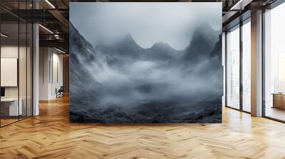 A dramatic and intense landscape of mountains shrouded in fog and mist, symbolizing mystery, solitude, awe, power, and tranquility. Wall mural