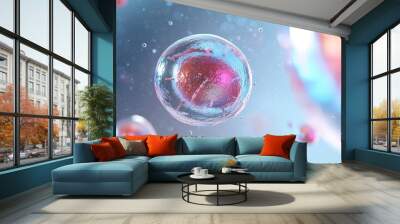 A microscopic image showcasing vibrant, colorful cells floating in a translucent medium, creating an abstract representation of life and biological processes. The blurred background adds a sense of de Wall mural