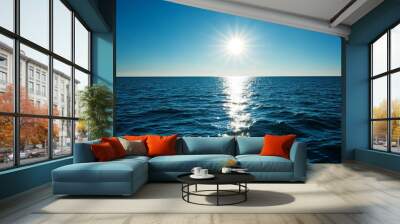 A serene image of the sun illuminating the calm ocean surface, symbolizing peace, tranquility, vastness, and the beauty of nature. Wall mural