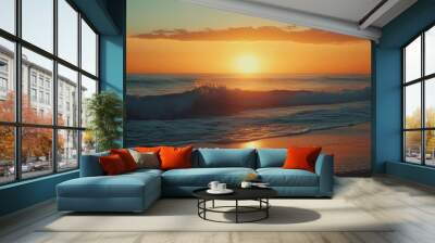 A serene seascape at sunset, featuring a golden sky, waves crashing on a sandy beach, and a distant sun. This image evokes feelings of tranquility, peace, and the beauty of nature. Wall mural