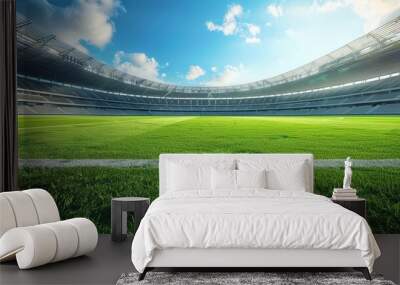 A panoramic view of a soccer stadium, showcasing a lush green field ready for action under a bright blue sky. This image evokes feelings of excitement, anticipation, and the thrill of the game. Wall mural