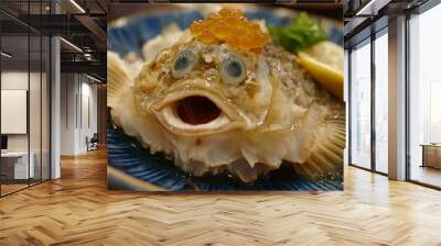 A plate of Sculpin fish sashimi, a Japanese delicacy prepared with thinly sliced raw fish, garnished with orange roe,  fresh lemon and green herbs. Wall mural