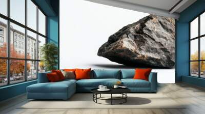 A single, flat, gray rock is isolated on a white background. The rock has a rough texture and is slightly weathered. It symbolizes strength, stability, and the natural world. Wall mural