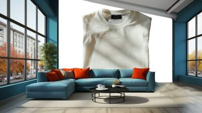 Folded white t-shirt with shadow overlay in sunlight. Minimalistic and elegant, perfect for apparel fashion stock photo needs. Wall mural