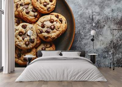 A plate of newly baked chocolate chip cookies with text area Wall mural