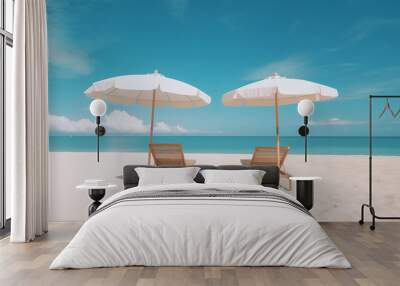 wo parasol umbrellas casting the shadow over the two wooden lounge chairs or easy chairs on an empty sunny sand beach near the blue ocean or sea water on a summer day. Sun protection on a holiday Wall mural