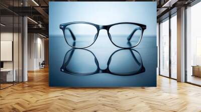 Minimalist photograph of elegant glasses on reflective surface, stylish, minimal, eyewear, fashion, accessory, reflection, elegant Wall mural